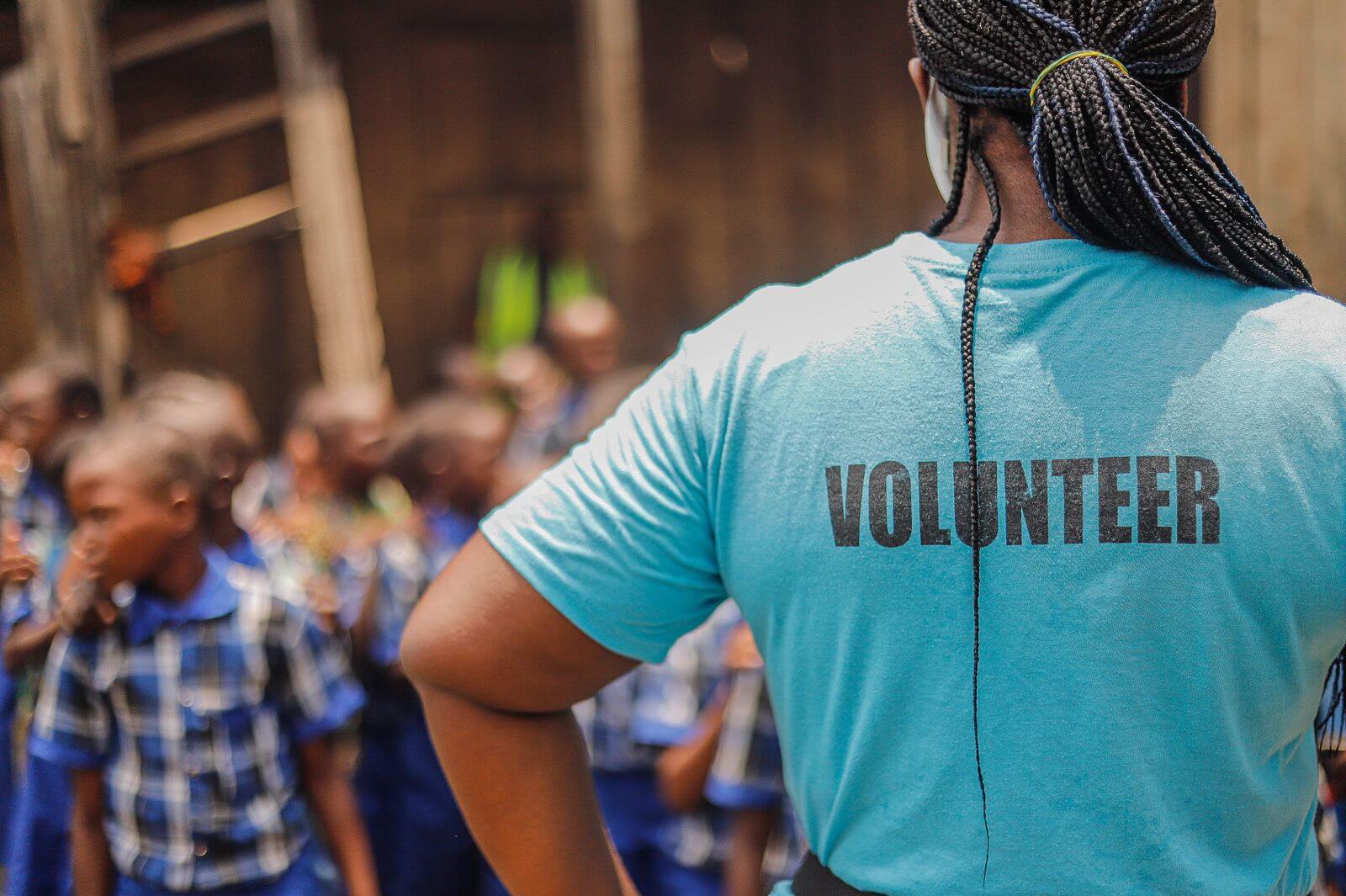A GAAS Africa volunteer engaging with children in the community